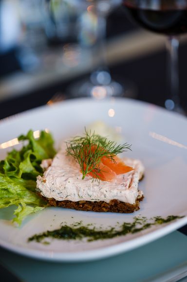 close up of an appetizer on a white plate